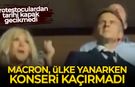 Fransa alev alev yanarken Macron konserde eğlendi!