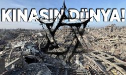 Kınasın Dünya!