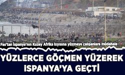 Yüzlerce kişi yüzerek İspanya'ya göç ediyor