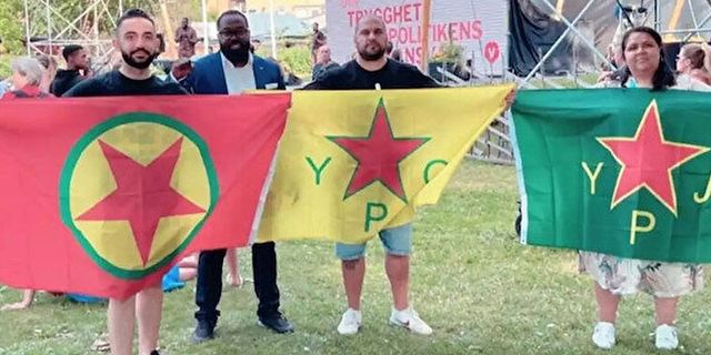 İsveç'te terör örgütü PKK bayrağı açan Sol Partili vekiller tepki çekti