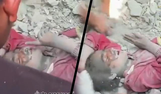 Enkaz altında dahi şehadet parmağı havada! Küçük kız, Siyonist saldırı sonrası enkazdan böyle çıkarıldı