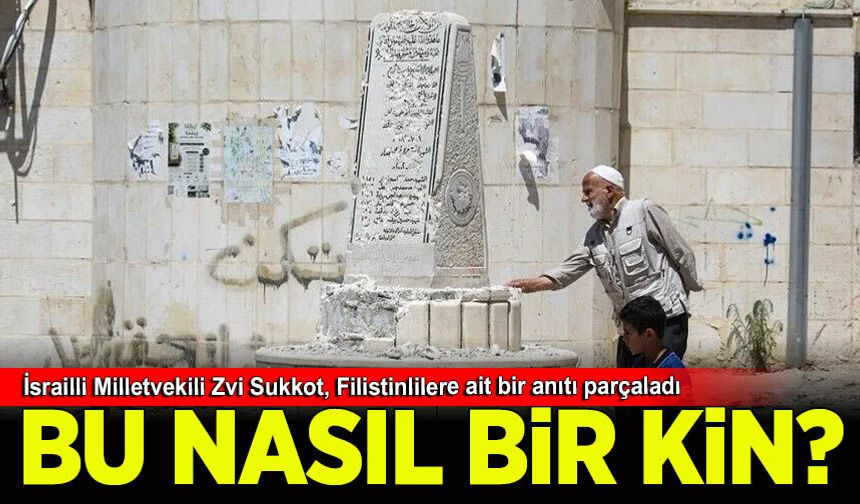 İsrailli aşırı sağcı Milletvekili Zvi Sukkot, askerlerin korumasında Filistinlilere ait bir anıtı parçaladı