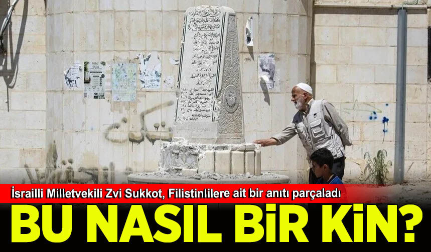 İsrailli aşırı sağcı Milletvekili Zvi Sukkot, askerlerin korumasında Filistinlilere ait bir anıtı parçaladı